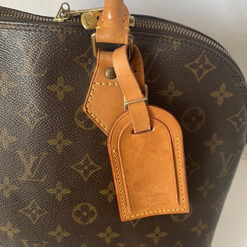 Authentic LOUIS VUITTON Alma Monogram Handbag - Picture 16 of 17